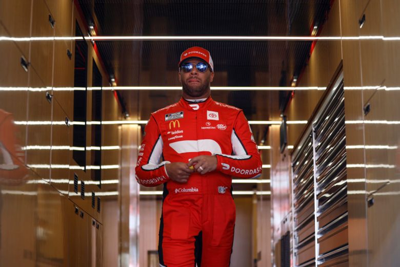 Bubba Wallace exits his hauler