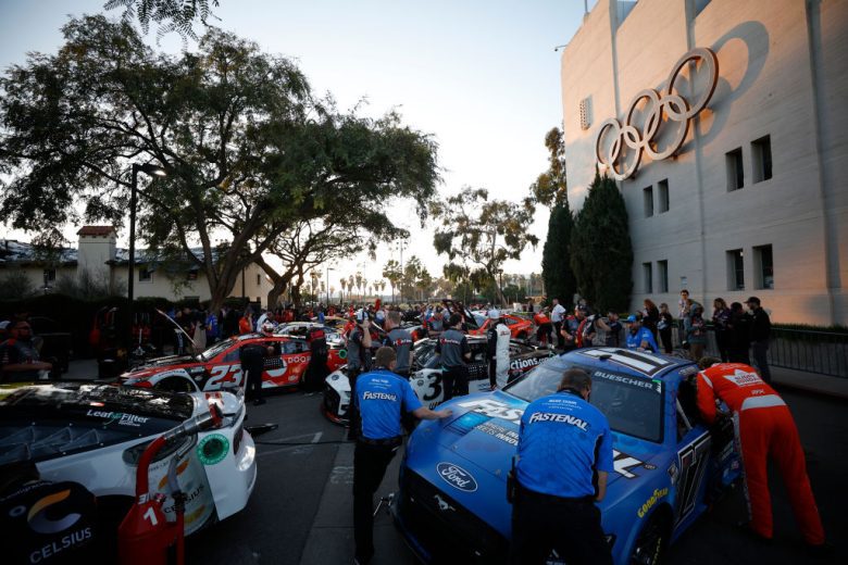 Crews prepare cars for qualifying