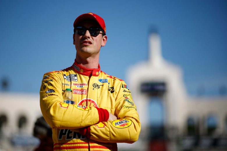 Joey Logano looks on