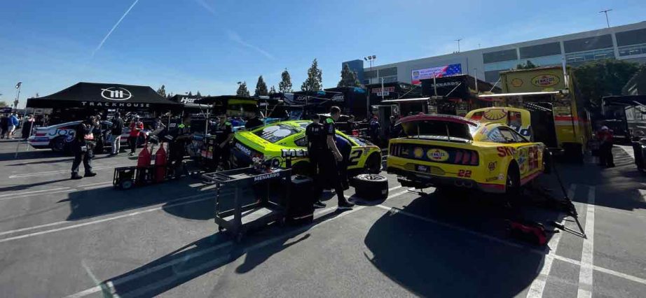 Teams work on cars before Busch Light Clash at The Coliseum practice