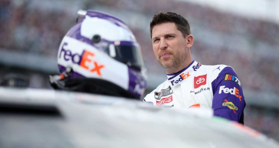 Denny Hamlin emerges from his car