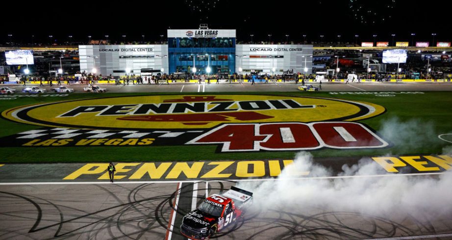 Kyle Busch performs a burnout