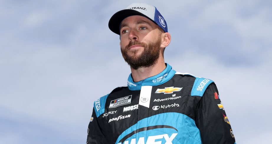 Ross Chastain walks down pit road at Las Vegas
