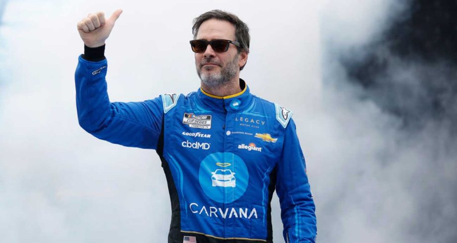 Jimmie Johnson gives thumbs-up sign during driver introductions at Daytona.