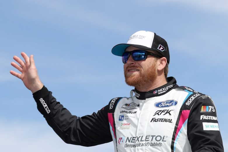 Chris Buescher waves to crowd.