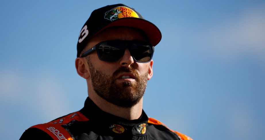 Austin Dillon looks on.