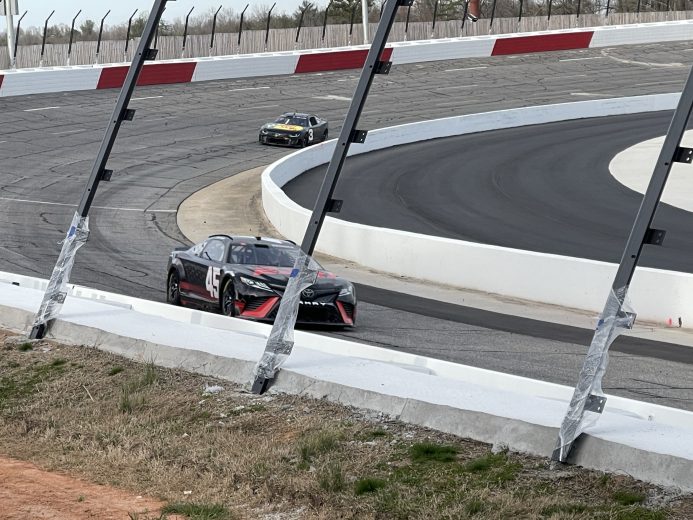 Tyler Reddick and Austin Dillon drive through Turn 4 at North Wilkesboro Speedway during testing