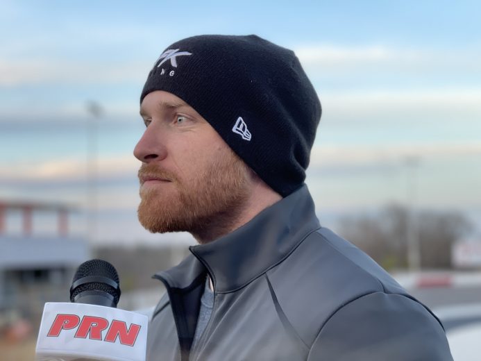 Chris Buescher speaks with media members after testing at North Wilkesboro