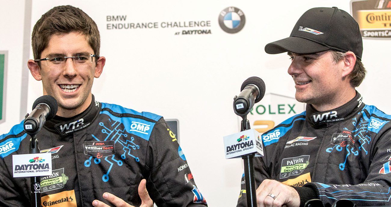 jordan taylor and jeff gordon at a press conference