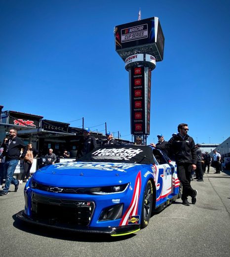 Kyle Larson's car rolls through the garage at Richmond