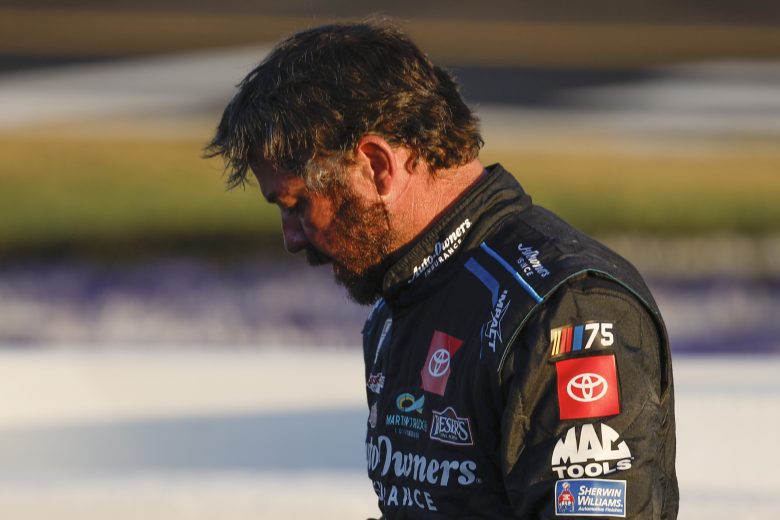Martin Truex Jr. walks dejectedly after racing at Richmond