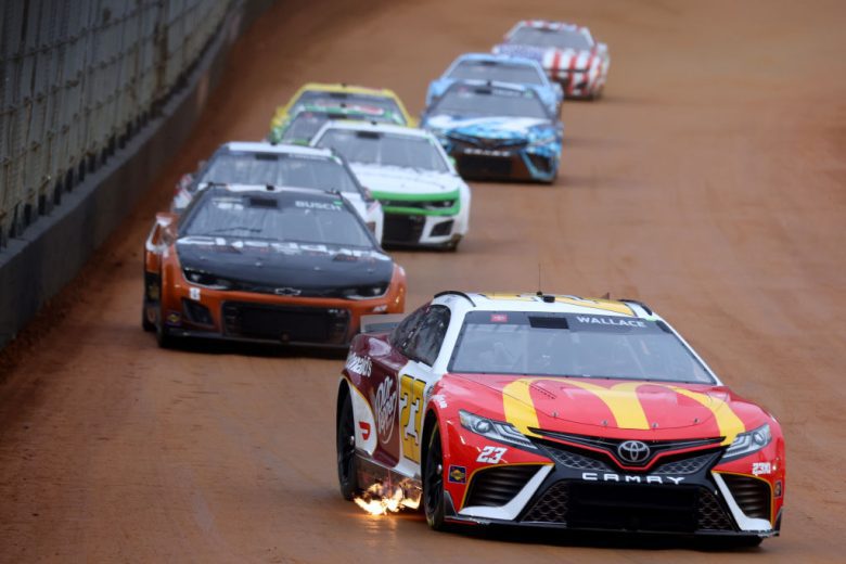 Cup cars drive on the Bristol dirt