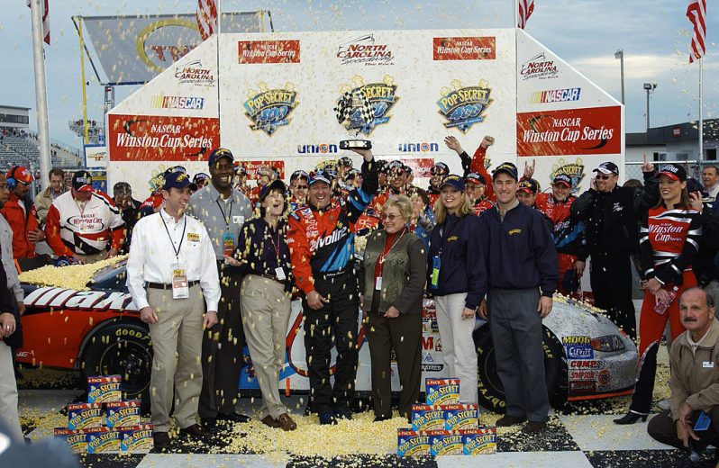 Johnny Benson celebrates win at Rockingham Speedway.