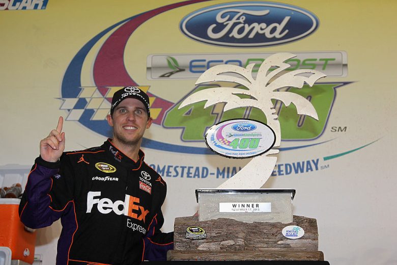 Denny Hamlin celebrates win at Homestead-Miami Speedway.