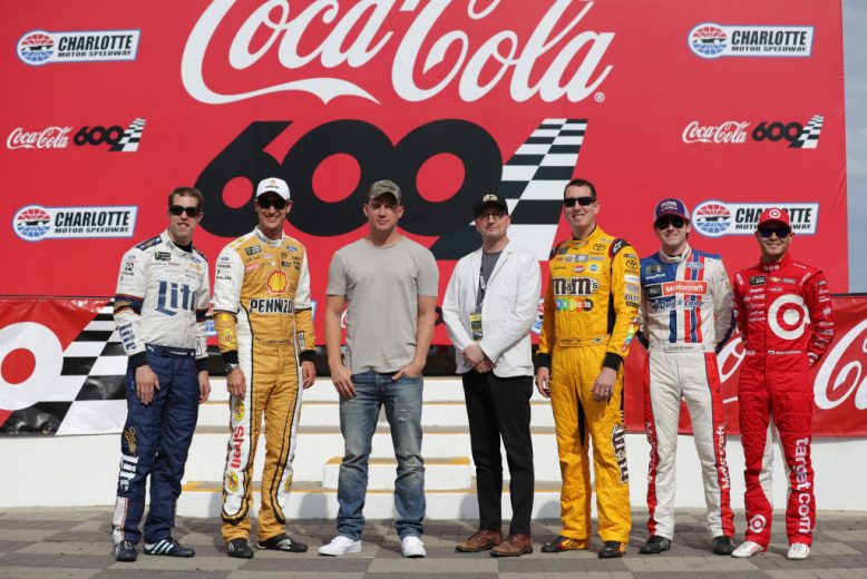 Channing Tatum poses with drivers at Charlotte