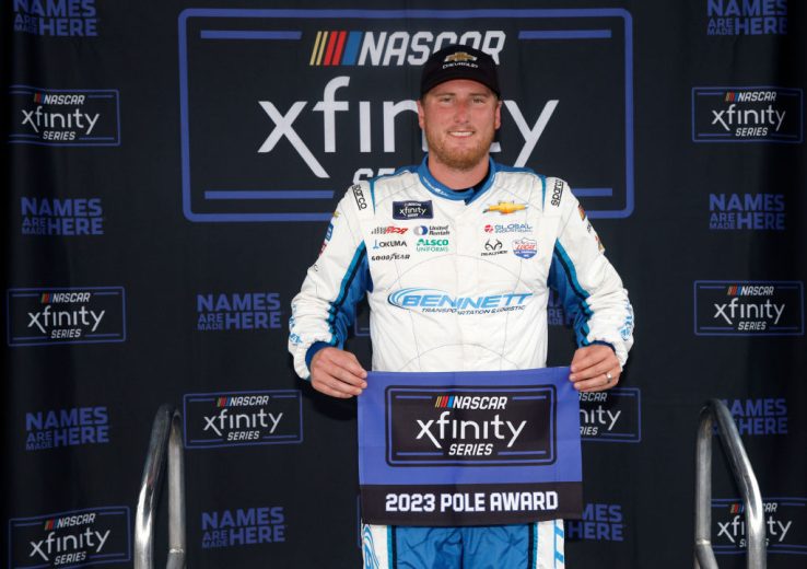Austin Hill poses with pole award