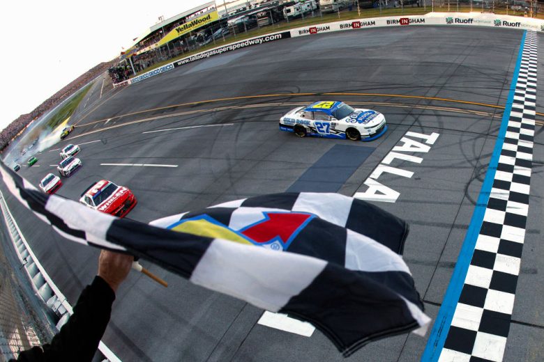 Jeb Burton crosses the start/finish line
