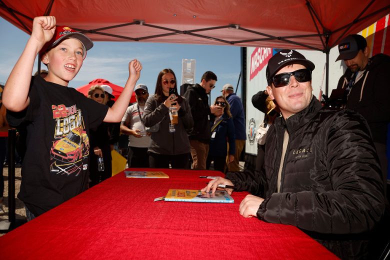 Erik Jones takes a photo with fans