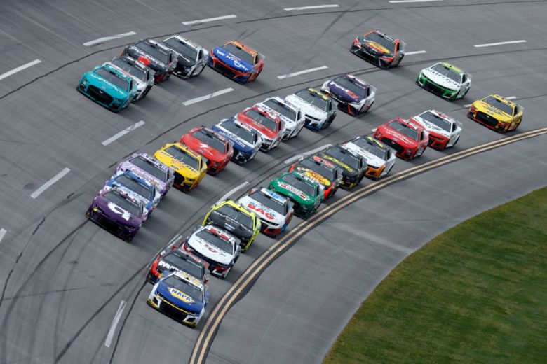 Cars race three-wide at Talladega