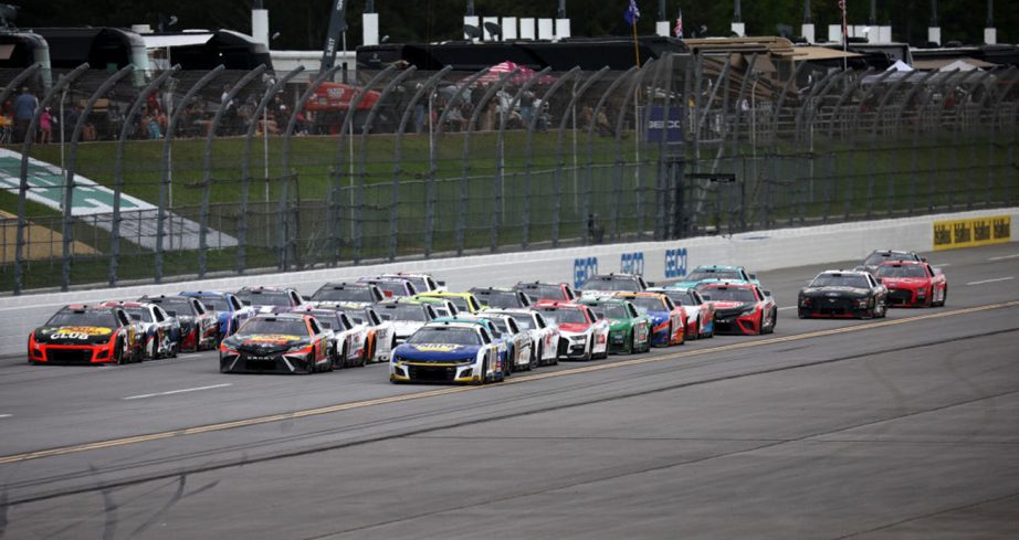 Cars race three-wide at Talladega