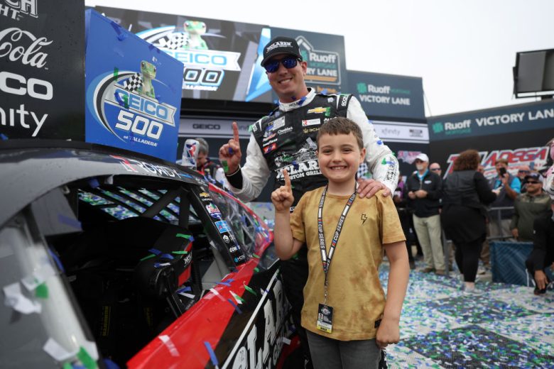 Kyle Busch celebrates in Victory Lane