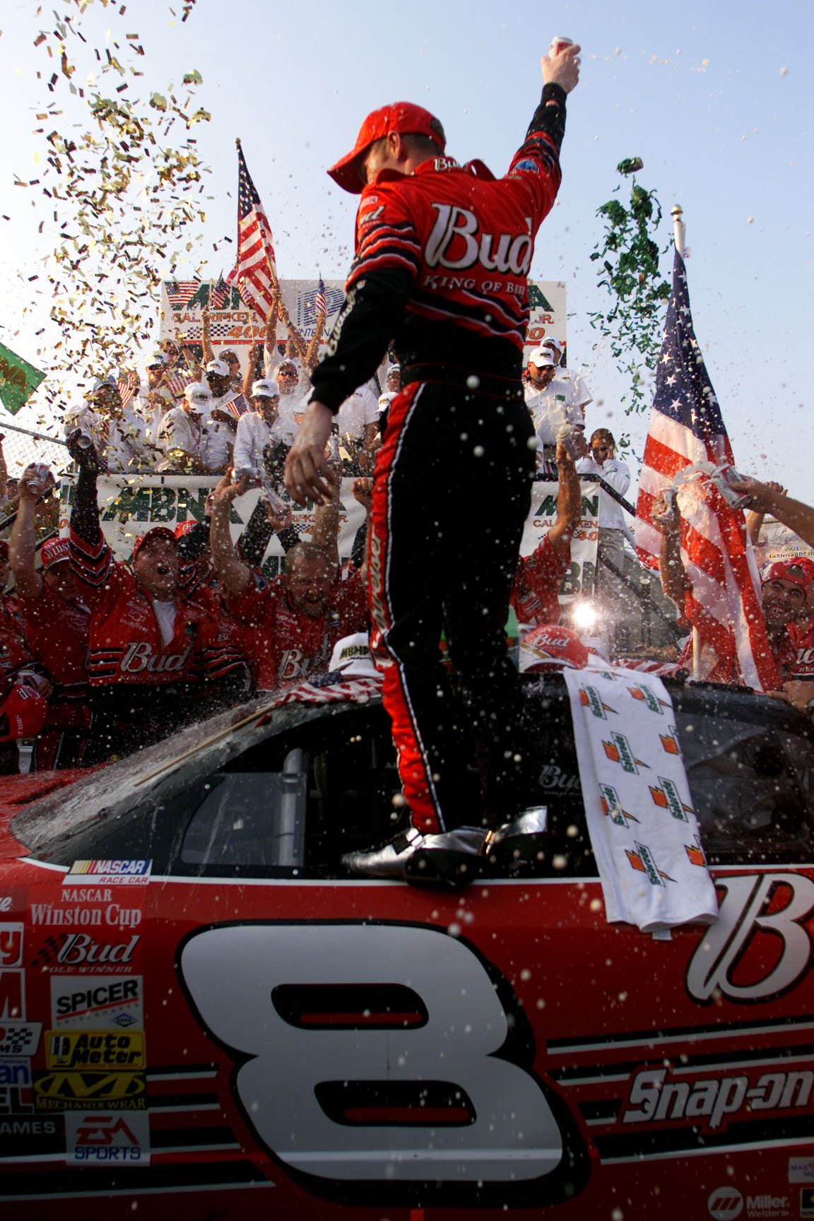 23 Sep 2001: Dale Earnhardt Jr. stands victoriously on his #8 Budweiser Cheverolet Monte Carlo following his win in the MBNA-Cal Ripken Jr. 400 at Dover Downs International Speedway in Dover, Delaware. Digital Image. Mandatory Credit: Jamie Squire/ALLSPORT