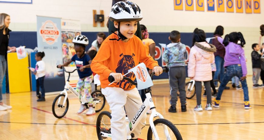 Kids Racing Bicycle Chicago Street Race, NASCAR Foundation deliver bikes to schools