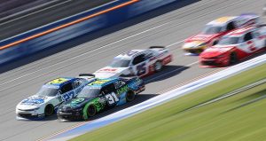 Jordan Anderson Racing teammates Jeb Burton (27) and Parker Retzlaff (31) lead the field at Talladega Superspeedway