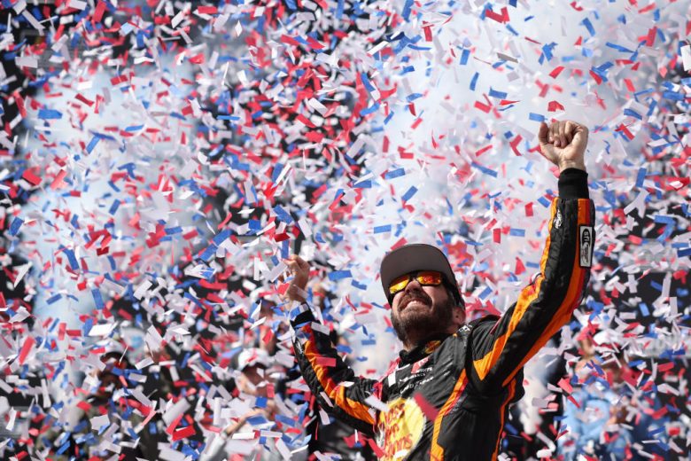Martin Truex Jr. celebrates win at Dover Motor Speedway.