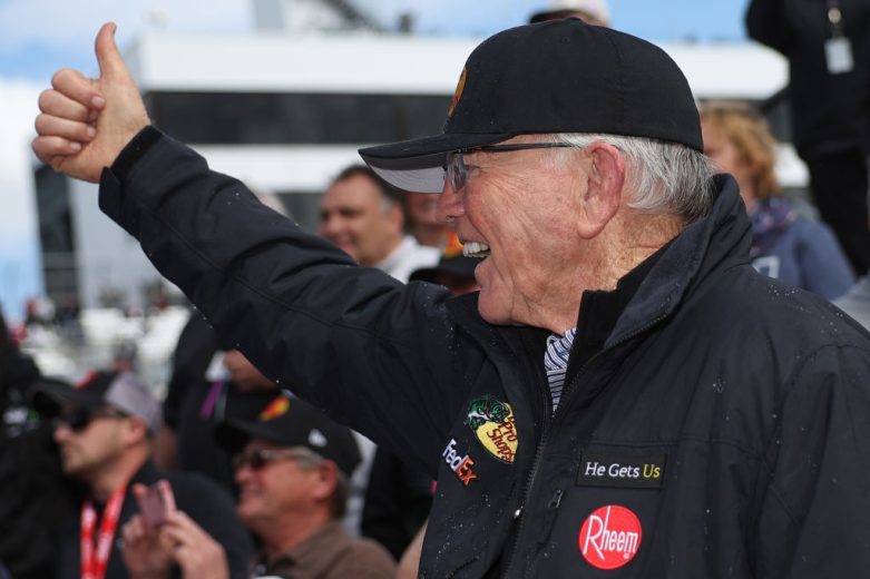 Joe Gibbs gives thumbs up after JGR win at Dover Motor Speedway.
