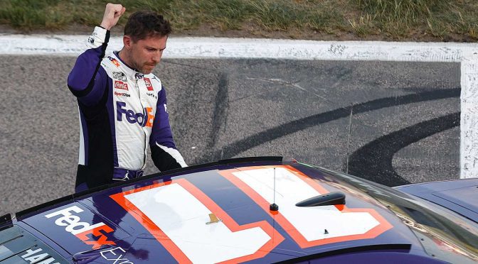Denny Hamlin bumps by Kyle Larson on last lap for Kansas win