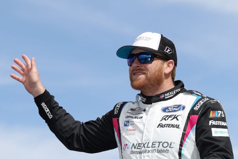 Chris Buescher waves to crowd.