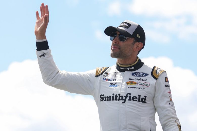 Aric Almirola waves to crowd.