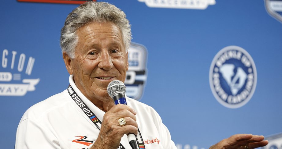 Mario Andretti speaks to the media