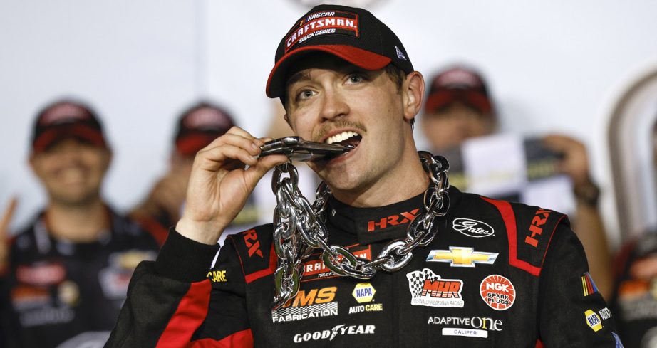 Christian Eckes celebrates in Victory Lane at Darlington.