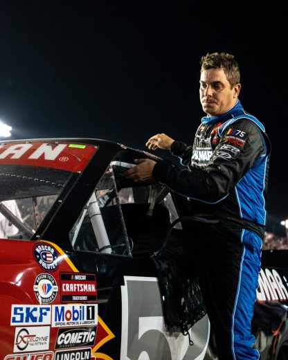 Stewart Friesen climbs out of his truck