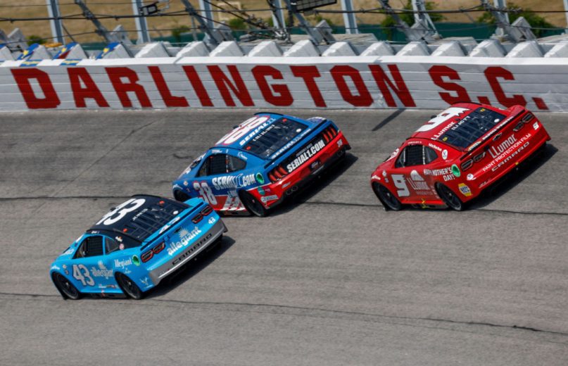 Erik Jones, Todd Gilliland and Chase Elliott race at Darlington Raceway.