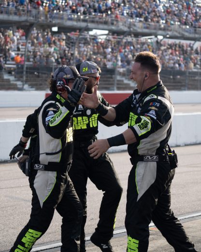 William Byron's pit crew celebrates after win at Darlington Raceway.