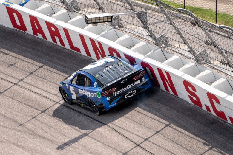 Kyle Larson rides wall at Darlington Raceway.