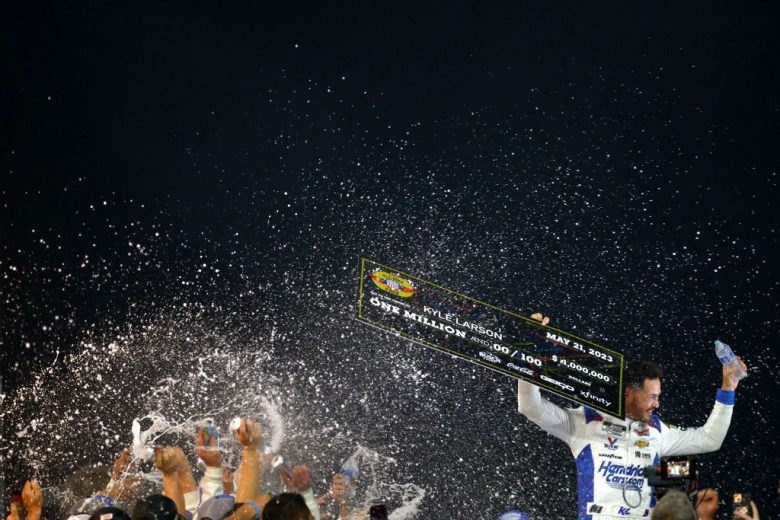 Kyle Larson celebrates in Victory Lane