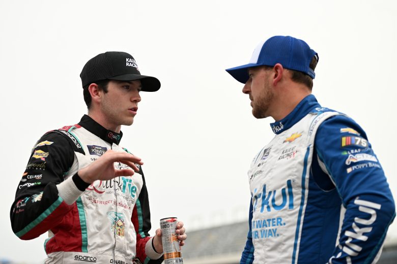 CONCORD, NORTH CAROLINA - MAY 26: Chandler Smith, driver of the #16 Quick Tie Products Inc. Chevrolet, and Daniel Hemric, driver of the #11 Cirkul Chevrolet, speak on the grid during qualifying for the NASCAR Xfinity Series Alsco Uniforms 300 at Charlotte Motor Speedway on May 26, 2023 in Concord, North Carolina. (Photo by Logan Riely/Getty Images)