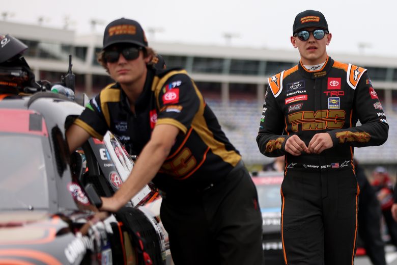 CONCORD, NORTH CAROLINA - MAY 26: Sammy Smith, driver of the #18 TMC Toyota, walks the grid during qualifying for the NASCAR Xfinity Series Alsco Uniforms 300 at Charlotte Motor Speedway on May 26, 2023 in Concord, North Carolina. (Photo by David Jensen/Getty Images)
