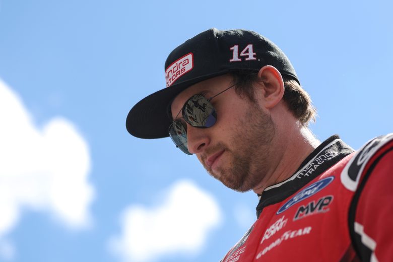 DOVER, DELAWARE - MAY 01: Chase Briscoe, driver of the #14 Mahindra Tractors Ford, walks onstage during driver intros prior to the NASCAR Cup Series Würth 400 at Dover International Speedway on May 01, 2023 in Dover, Delaware. (Photo by James Gilbert/Getty Images)