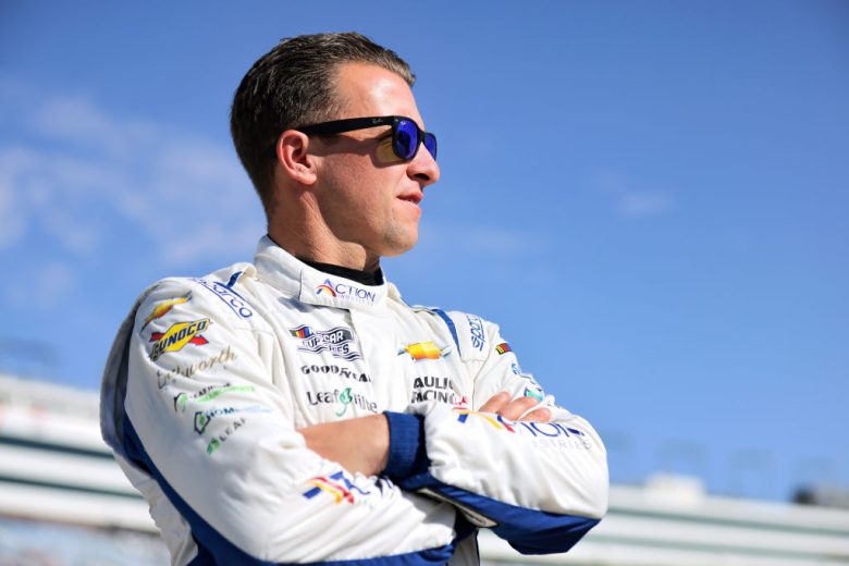 AJ Allmendinger looks on