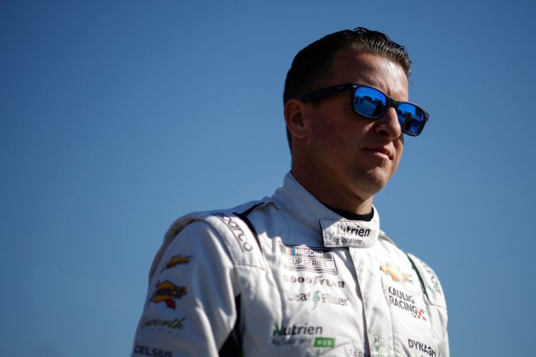 AJ Allmendinger looks on