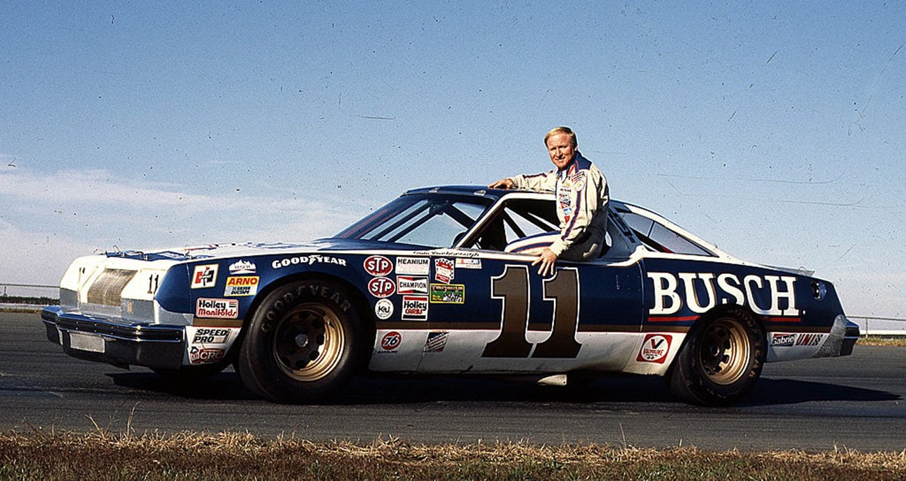 Cale Yarborough poses with his car