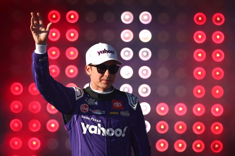Christopher Bell looks on