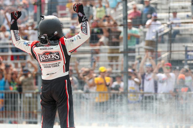 Martin Truex Jr. celebrates after win at New Hampshire Motor Speedway.