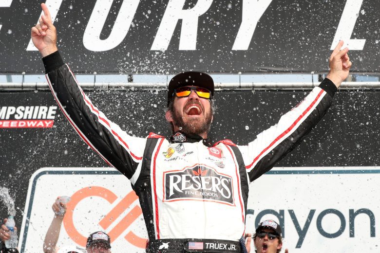 Martin Truex Jr. celebrates win at New Hampshire Motor Speedway.
