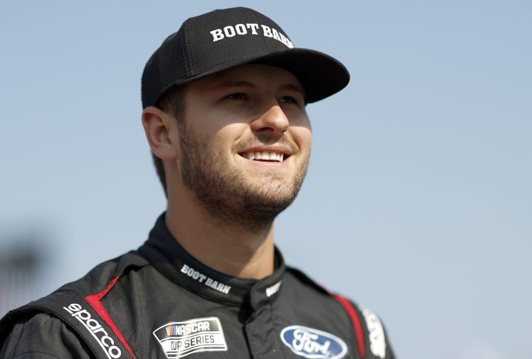 Todd Gilliland looks ahead smiling